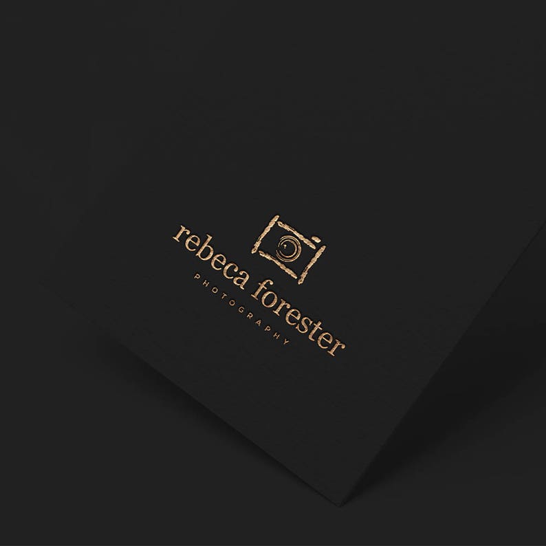 May include: A gold logo on a black background with the text "rebecca forester photography" and a stylized camera icon.