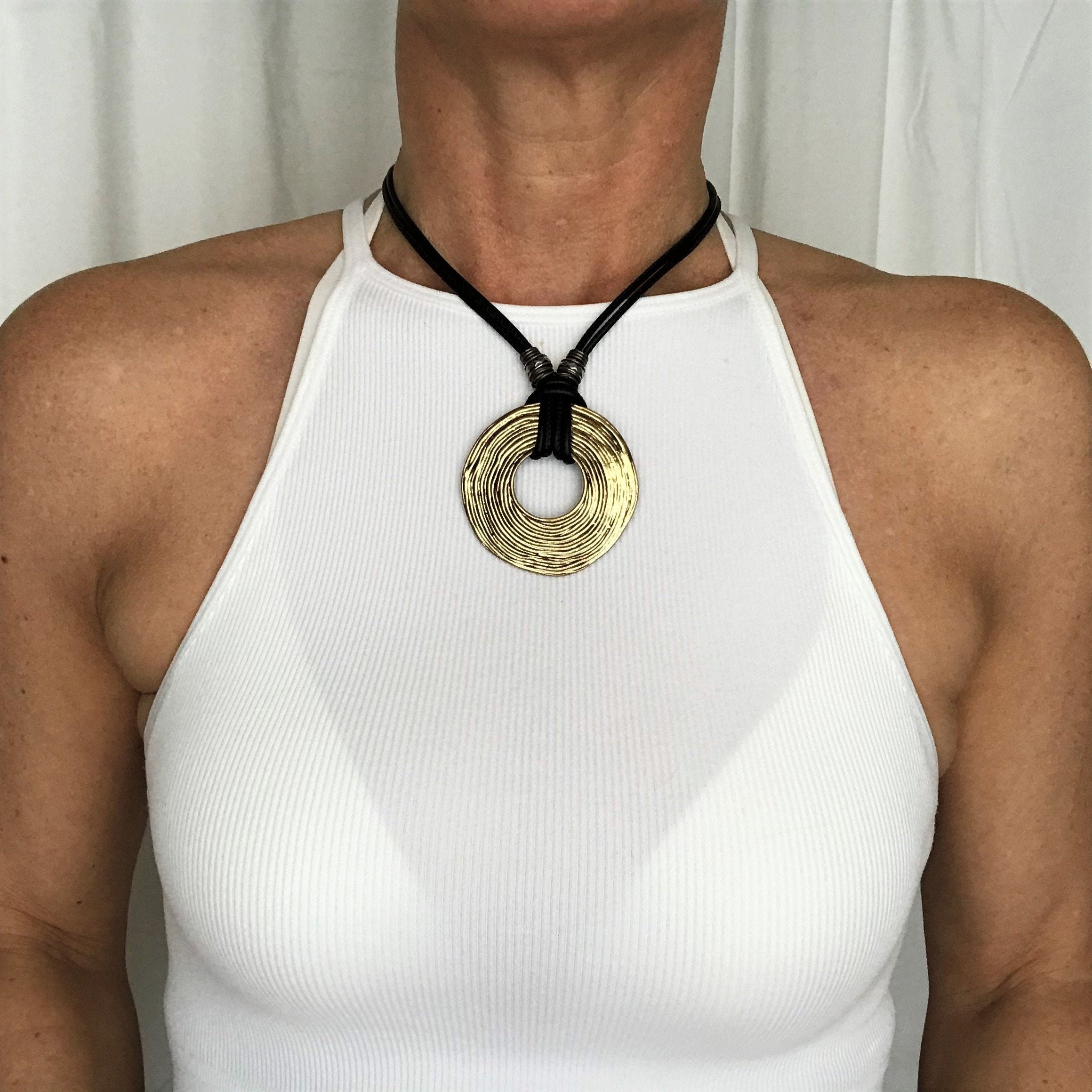 Black leather cord necklace with big antique gold pendant Etsy