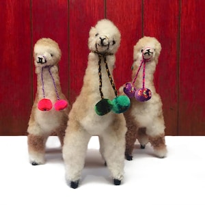 Piccolo ornamento di alpaca peruviano beige