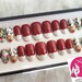 Tara Demmer reviewed Swarovski Red Nosed Reindeer | Christmas | Santa | Rudolph | Hand Painted False Nails | Little Nail Designs
