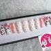 Helen Alvarez reviewed Hello Kitty False Nails Pink and White | Bow Charm | Cute