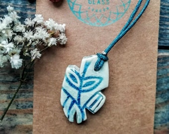 Leaves pattern ceramic pendant, unusual irregular shape, white and blue with adjustable waxed cotton cord necklace.