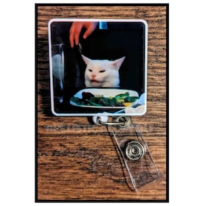 Badge Reel | Badge holder | Lanyard | meme | cat at table | unbothered | correcting cat | funny feline | humor | popular meme | ADD bead