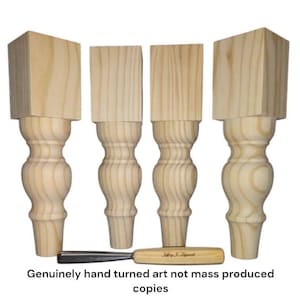 May include: Four wooden table legs with a turned, bulbous design. The legs are unfinished and ready to be stained or painted.  The text "Genuinely hand turned art not mass produced copies" is visible at the bottom of the image.
