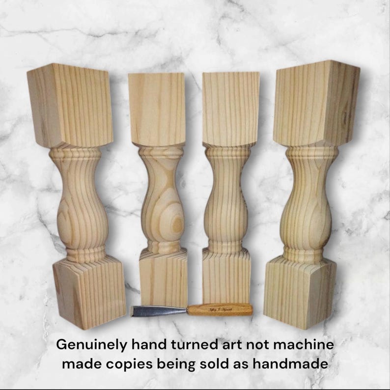 May include: Four unfinished wooden table legs with a turned design. The legs are made of light wood and have a square base. The text "Genuinely hand turned art not machine made copies being sold as handmade" is at the bottom of the image.