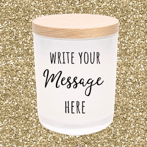 May include: White candle with a wooden lid. The candle has the text "Write your message here" on the front.