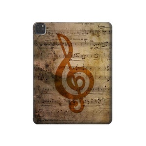 May include: A vintage sheet music background with a large orange treble clef symbol. The music notes are faded and worn, giving the image a rustic look.