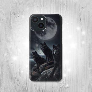 May include: Phone case with a design of three black wolves on a rocky outcrop, set against a full moon and night sky. The artwork has a dark, dramatic style. The wolves are realistically rendered.