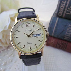 Vintage Seiko Gold Plated Men&#39;s Wristwatch with Early SQ Vintage Quartz Movement - Rare Japanese/English Date Window - Circa 1970&#39;s