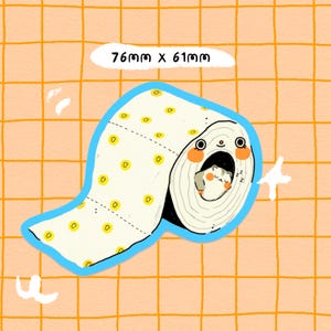 May include: A white toilet roll with yellow dots and a blue border. A small hamster is sleeping inside the roll. The text "76mm x 61mm" is written above the roll.