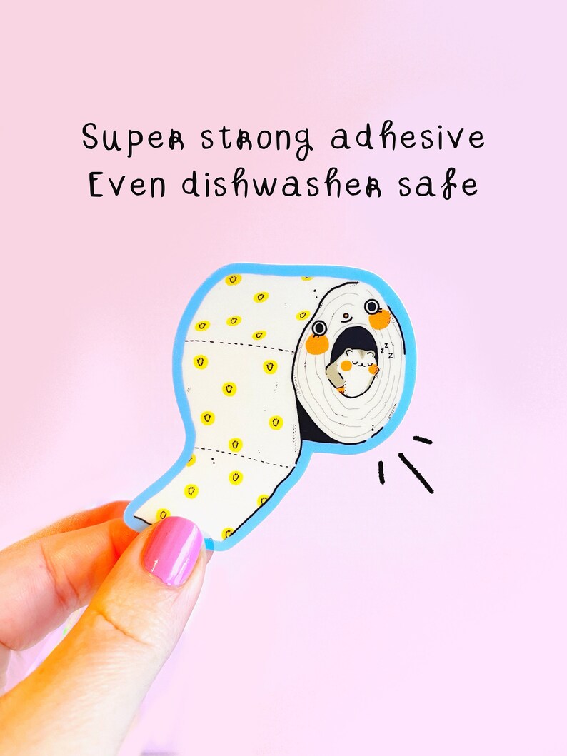 May include: A blue and white sticker of a toilet paper roll with a hamster peeking out. The sticker has yellow dots and the text "Super strong adhesive Even dishwasher safe".
