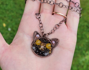 Collier chat tigré en cuivre