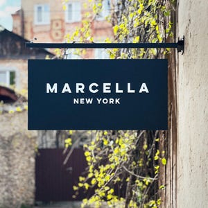 Custom Iron Storefront Sign: Minimalist Business Logo Signage