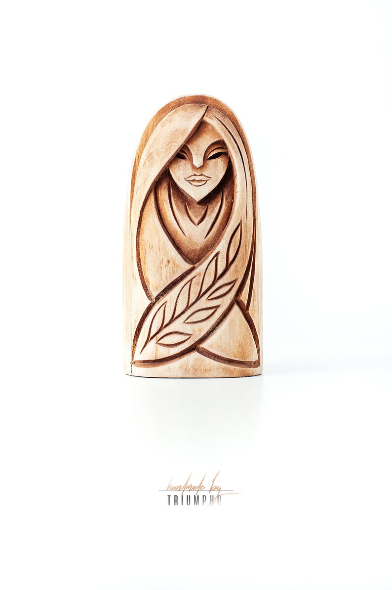 Wooden figurine  a goddess Eir. Goddess of medicine. Nordic image 0