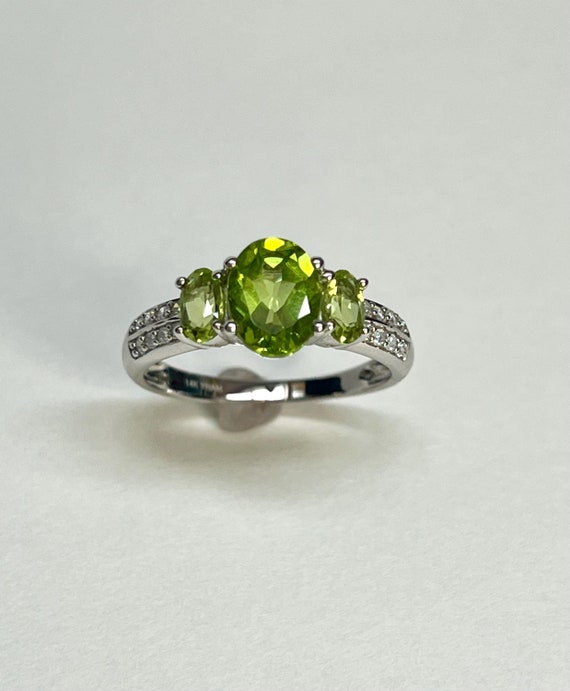 Sterling Silver And 14K Gold Double Peridot Pear Diamond ByPass Ring Sterling Silver And 14K Gold Double Peridot Pear Diamond ByPass Ring