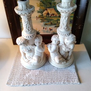 Angel candle holder, little angel offering flowers Plaster candlesticks