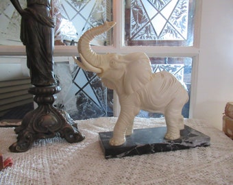 African elephant sculpture by s" Santini.