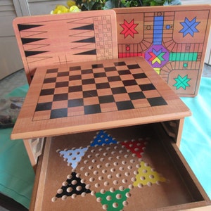Wooden box of multiple games