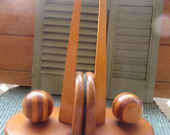 Art deco wooden bookend ball and pallets