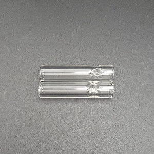 May include: Two clear glass smoking pipes, one on top of the other.