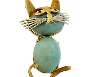 1960's turquoise "cat" brooch in 18K yellow gold