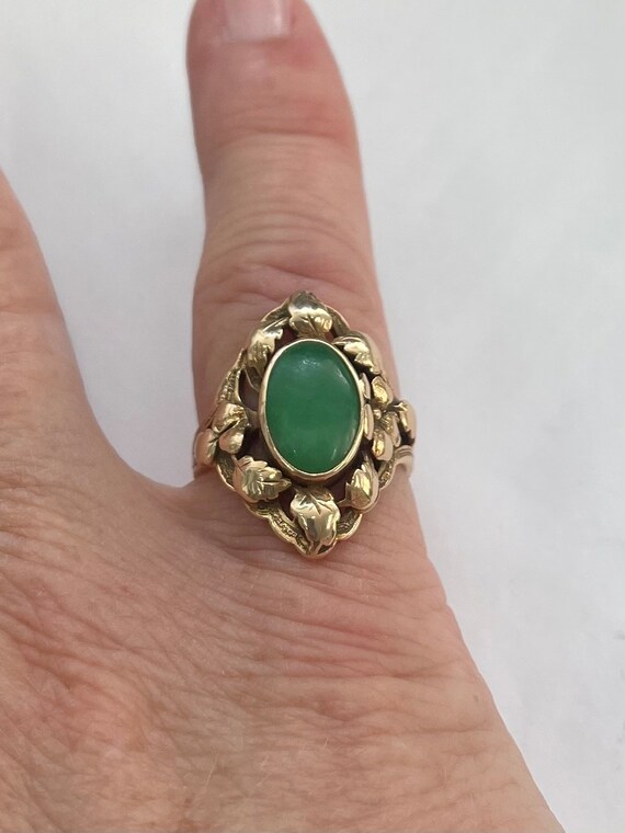 14K gold oval jade ring with floral leaf design - image 4