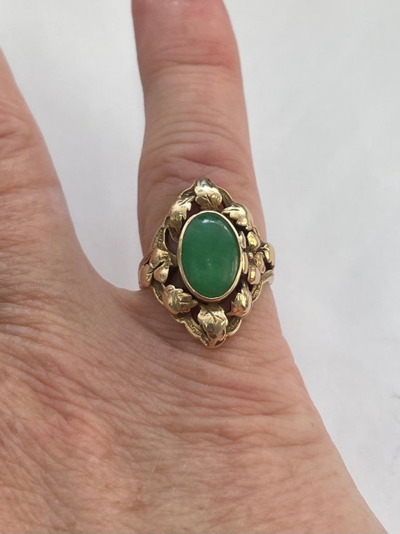 14K gold oval jade ring with floral leaf design - image 5