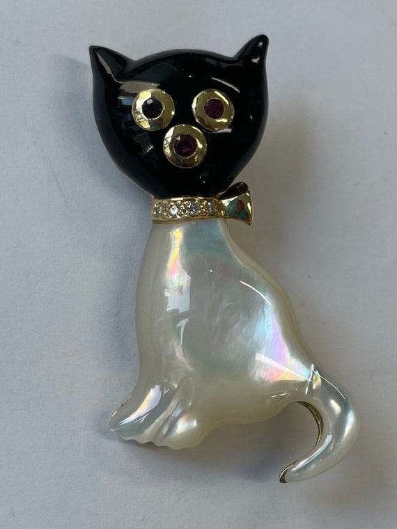 18K gold MOP and onyx cat brooch with ruby eyes an
