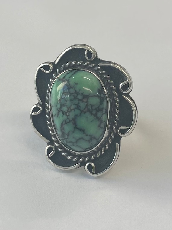 Silver ring with oval turquoise