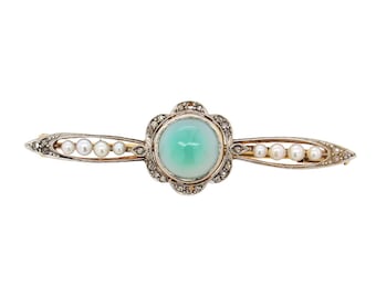 Antique 18K bar pin with platinum top and center cabochon jadeite