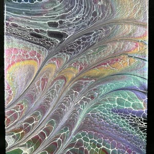 May include: Abstract acrylic pour painting on canvas. The artwork features a flowing design with a mix of colors, including purple, green, yellow, and white. The paint has a textured appearance with cells and swirls, creating a unique visual effect.