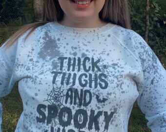 Thick thighs and spooky vibes sweatshirt.