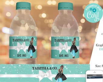 May include: Water bottle labels featuring a turquoise background with white stars and a white ribbon with a bow. The labels have the text "Tabitha & Co. Est. 2015" and a cartoon image of a woman wearing a black dress and a white hat. The labels are designed to be printed on 8 inch by 2 inch sheets.