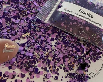 May include: Purple and pink glitter confetti in a clear plastic bag with the text "Bonita Etsy.com/shop/glitterboutique80918" on a white label.