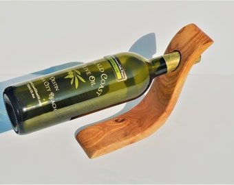 Olive wood gravity bottle holder S shape  ,Free expedited shipping, US seller