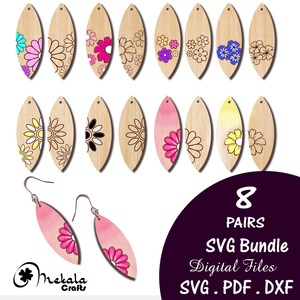 May include: Eight pairs of digital download SVG files for laser cutting earrings. The earrings are shaped like a teardrop and feature various floral designs in pink, blue, yellow, and black.