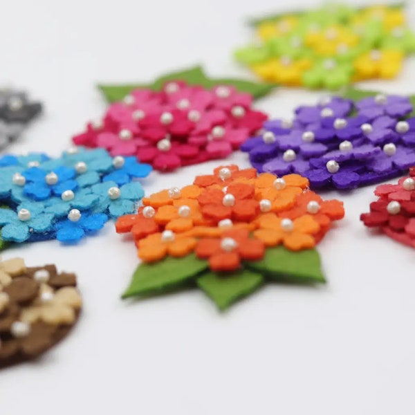 Felt floral alligator hair clips embellished with tiny white pearls. Available in many Colours (Pack of 1 piece)