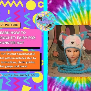 May include: A crocheted Fairy Fox Monster Hat on a mannequin head. The hat is white with blue and pink accents, featuring fox-like ears and a face. The image includes text: "Learn How to Crochet: Fairy Fox Monster Hat" and "Not a Finished Piece."