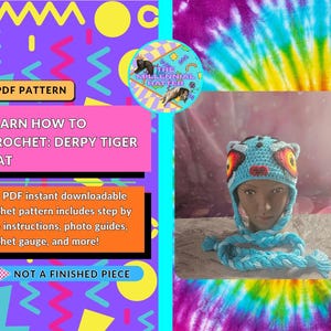 May include: A light blue crochet hat with tiger-like features, including large eyes with yellow and red accents, small ears, and two long braided ties. The text on the image reads PDF PATTERN LEARN HOW TO CROCHET: DERPY TIGER HAT.