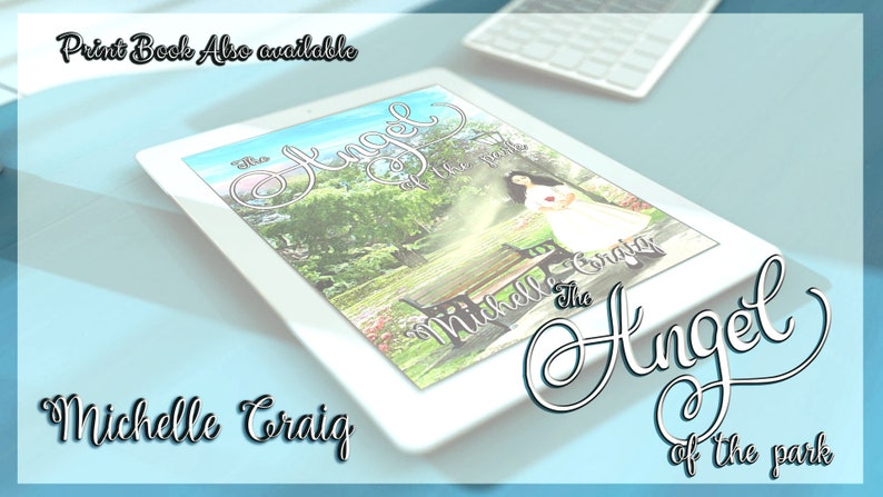 May include: A white tablet computer displaying the cover of a book titled "The Angel of the Park" by Michelle Craig. The cover features a woman in a white dress standing in a park with a bench and trees in the background.