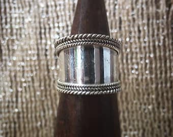 sterling silver band ring, braids on the sides, size 54