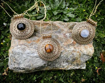 Shield Talisman pendant with central stone