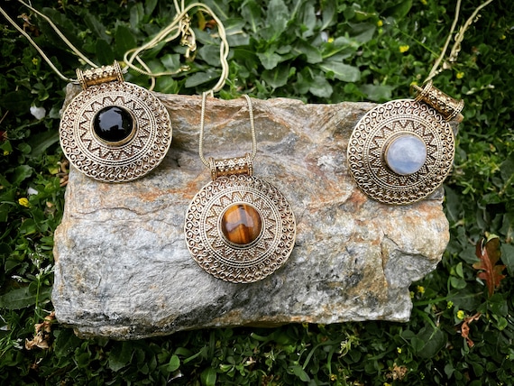 Shield Talisman pendant with central stone