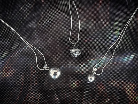 Angel Caller sterling silver pendants, harmony ball spiritual alignment pedant