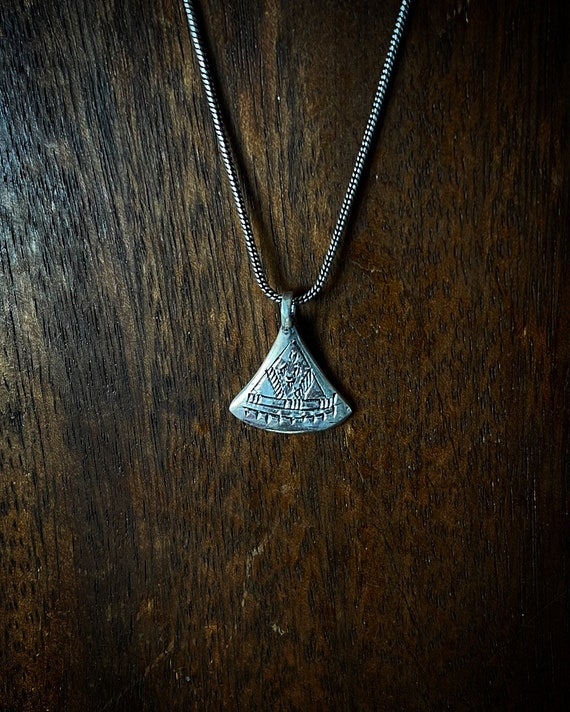Hand Carved little triangle pendant, tribal symbol