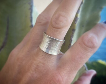 Hammered light curved sterling silver ring