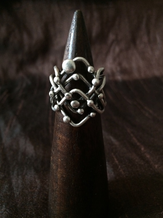 Lastrolabio ring
