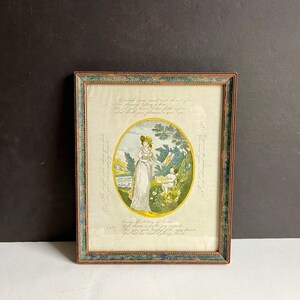 Vintage gerahmter Druck einer antiken handkolorierten Valentine Lithographie um 1920, Lotterie der Liebe, gelb und grün, Amor, prop
