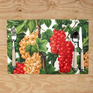 Botanical, vintage-style printed linen placemats. Green and red fruit table mats. Country table decor.
