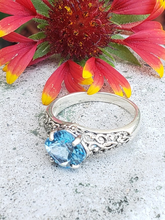 Woman's Sterling Silver Ring With Blue Topaz  - St